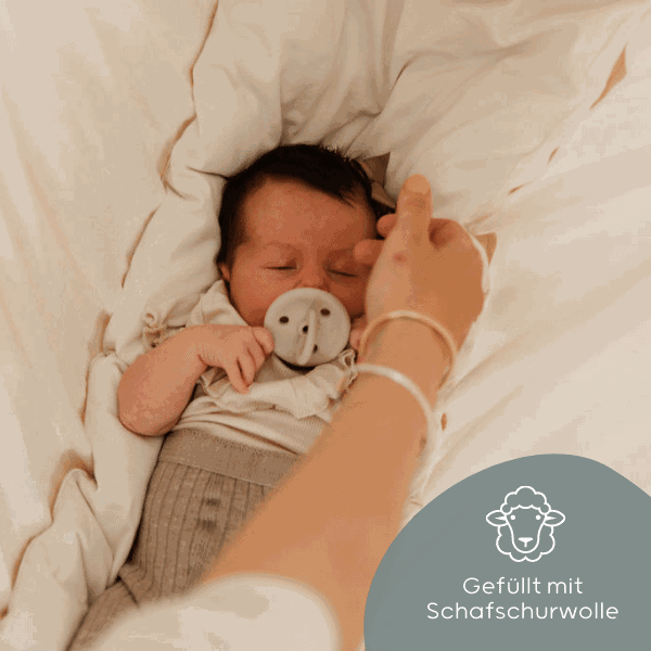 Sheep's wool mattress for the automatic baby hammock